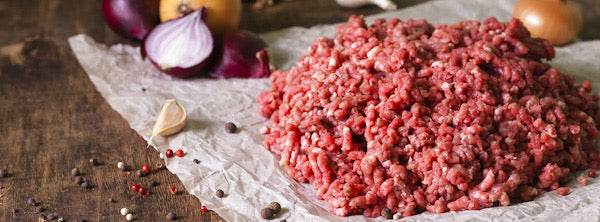 Beef minced, diced and slow cooking
